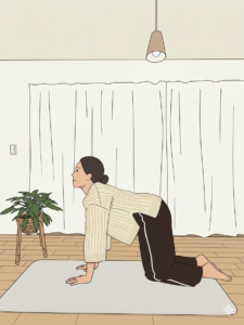 キャット＆カウをする女性